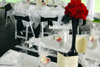 Red roses and Feathers centerpieces